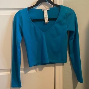 Stradivarius blue cropped long sleeve top